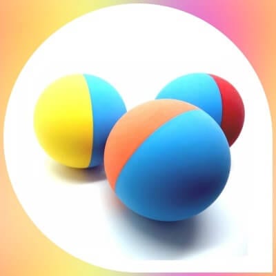 Snug Rubber Dog Balls  in various colors 